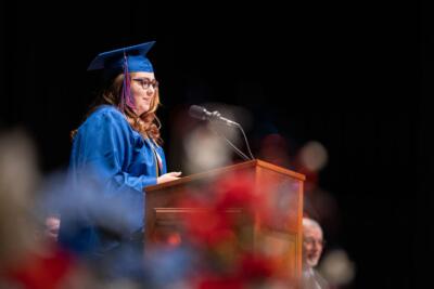 student speaking at her graduation