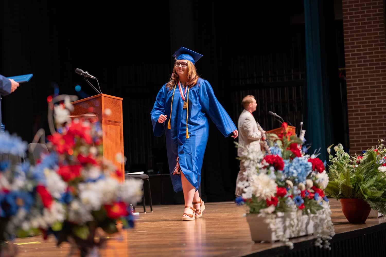 graduate student receiving the diploma